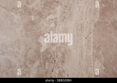 Textured beige marble surface showcasing natural patterns Stock Photo
