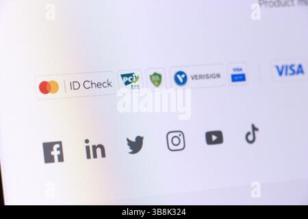 Social media and payment icons displayed on screen interface. Stock Photo