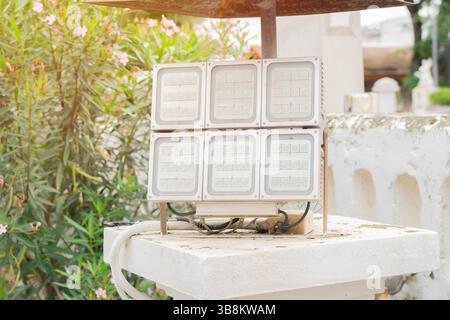 A large rectangular LED floodlight setting under the roof at park of a country side. Led projector concept. Stock Photo