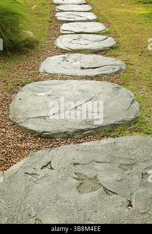 Artistic stone path in the Japanese style garden Stock Photo