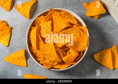 Salty Nacho Cheese Tortilla Chips in a Bowl Stock Photo