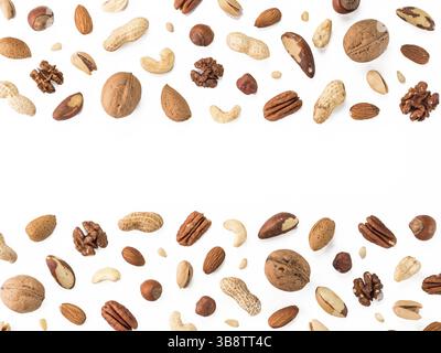 Pattern of nuts mix with copy space. Various nuts isolated on white. Pecan, macadamia, brazil nut, walnut, almonds, hazelnuts, pistachios, cashews, pe Stock Photo
