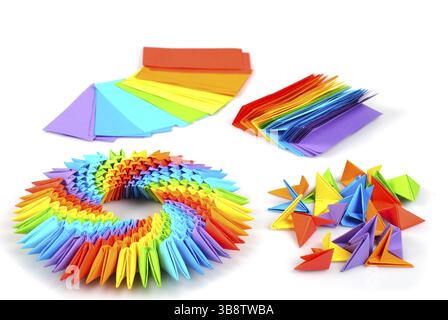 Colorfull origami 3d units like a rainbow circle isolated on white with shadow. From sheets of paper making modules, which joined Stock Photo