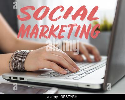 Social marketing concept. Close-up woman's hands using laptop keyboard for social media Stock Photo