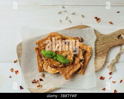 Gluten-freen crispbreads made of buskwheat flour. Green buckwheat flour smoked paprika sunflower seeds ingredients homemade baked crisp bread. Idea re Stock Photo