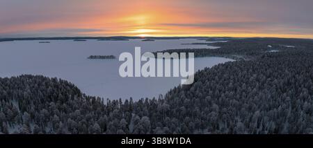 Frozen lake with island, winter landscape, Posio, Lapland, Finland, Europe Stock Photo
