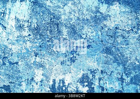 Abstract blue wall texture. Grunge painted background. Artistic surface pattern. Weathered and distressed effect. Peeling paint texture. Stock Photo