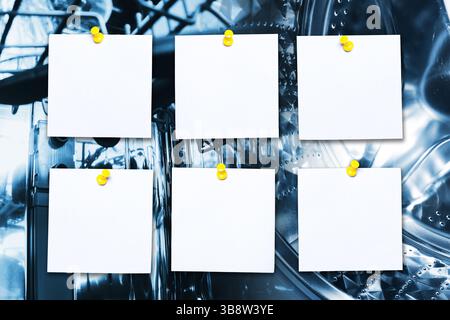 Blank notes hanging on clips closeup. Planning and organization concept with empty reminder cards and copy space. Stock Photo