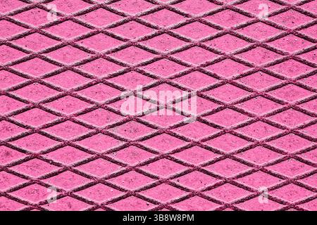 Pink textured background with diamond pattern. Decorative geometric surface. Grid mesh design in vibrant purple and black. Repeating symmetrical. Stock Photo