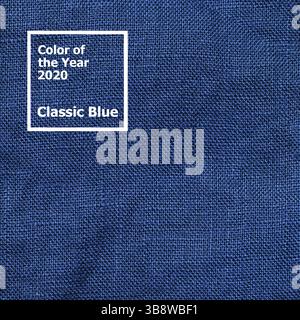 Abstract extreme close up linen textured background made of classic blue 2020 color. Color of year 2020 linen textile backdrop. COY2020 concept. Copy Stock Photo