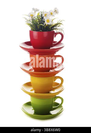 Colourful rainbow cups isolated on white Stock Photo