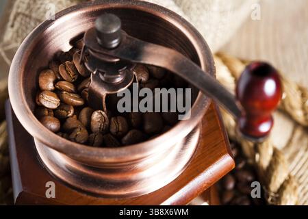 Coffee in grinder and rope still lfe Stock Photo