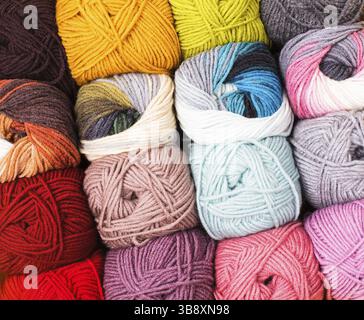 Various colors threads on rows in the store Stock Photo