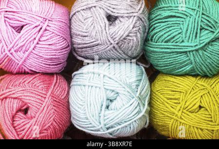 Various colors threads on rows in the store Stock Photo