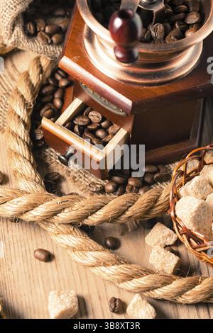 Coffee in grinder and rope still life Stock Photo