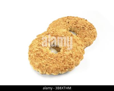 Two shortbread ring cookies with nuts. Sand ring with nuts isolated, white background. Shortcrust ring isolated on white with clipping path.Traditiona Stock Photo