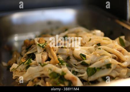 rice vermicelli with soy meat sauce. Spaghetti with sauce in white dish isolated on white background. High quality photo Stock Photo