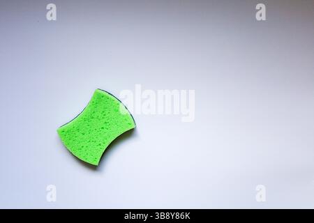 Foam sponge for washing dishes washing dishes with a sponge Stock Photo