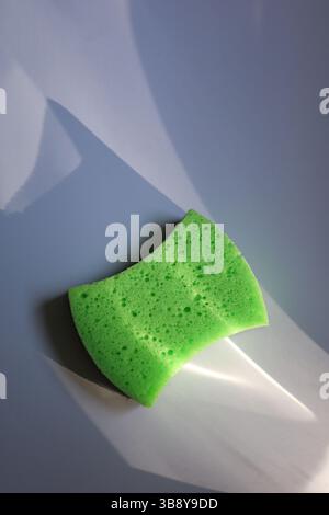 Foam sponge for washing dishes washing dishes with a sponge Stock Photo