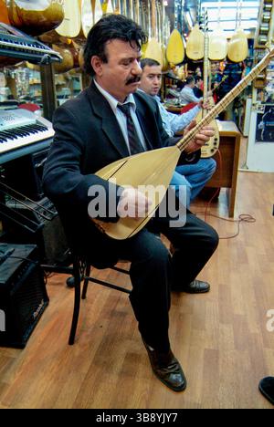 Traditional Turkey Instruments Istanbul, Turkey, Musical instrument shop with guitars and Lavtas that ...