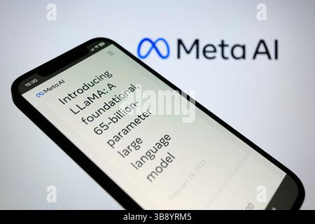 February 24, 2023, Asuncion, Paraguay: Meta website is displayed on a smartphone backdropped by Meta AI logo. ''As part of Meta's commitment to open science, today we are publicly releasing LLaMA (Large Language Model Meta AI), a state-of-the-art foundational large language model designed to help researchers advance their work in this subfield of AI,'' Meta Platforms said on Friday. (Credit Image: © Andre M. Chang/ZUMA Press Wire) Stock Photo