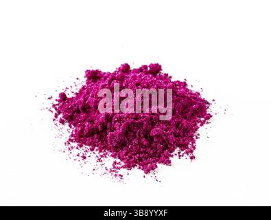 Dragon fruit powder heap isolated on white with clipping path. Perfect bright magenta freeze dried pitahaya cactus or Hylocereus costaricensis powder Stock Photo