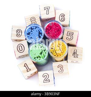 Various color counting sticks wooden cubes with digits isolated Stock Photo
