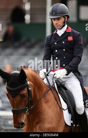 Harry Meade of Great Britain with Superstition during the dressage at ...