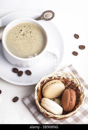 Three colors of macaroons in brown and beige tones Stock Photo