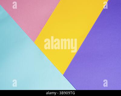 Colorful colored paper background. Multicolor blue, yellow, pink, lilac background. Copy space for text. Abstract pattern can use for design, wallpape Stock Photo