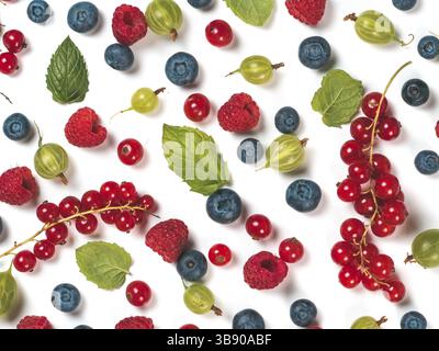 Various fresh summer berries background. Pattern of fresh blueberries, red currant, raspberries, gooseberries isolated on white background. Top view o Stock Photo
