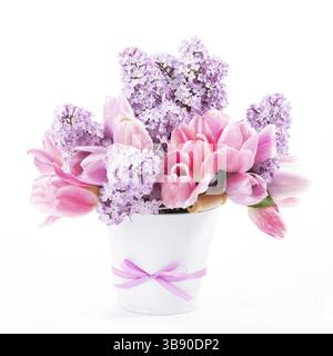 Bouquet from pink tulips and lilac on white Stock Photo