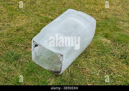 A large piece of ice in the shape of a rectangular parallelepiped Stock Photo