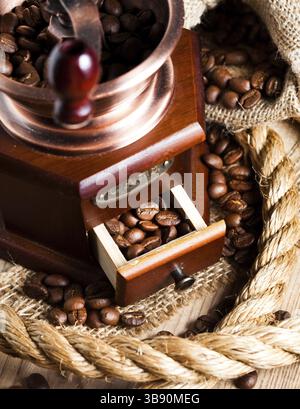 Coffee in grinder and rope still life Stock Photo
