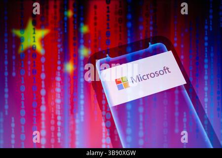 July 12, 2023, Asuncion, Paraguay: Microsoft logo is displayed on a smartphone backdropped by binary code digits and cropped flag of China. ''Microsoft has mitigated an attack by a China-based threat actor Microsoft tracks as Storm-0558 which targeted customer emails. Storm-0558 primarily targets government agencies in Western Europe and focuses on espionage, data theft, and credential access. Based on customer reported information on June 16, 2023, Microsoft began an investigation into anomalous mail activity. Over the next few weeks, our investigation revealed that beginning on May 15, 2023, Stock Photo