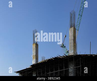 work site Structure of the newly building, Construction site in suburban area of big city. Stock Photo
