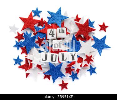 Festive USA stars in patriotic red, white, and blue sparkling glitter confetti with 4th of July text. Stock Photo