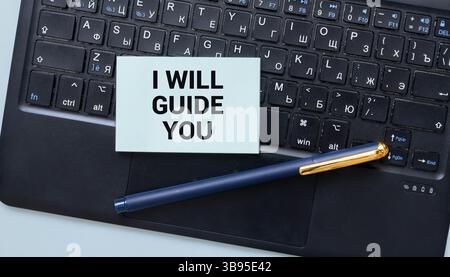 I Will Guide You inscription on the piece of paper. Stock Photo