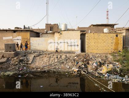 October 30, 2021, Basra, Iraq: ''When the weather is humid, the air becomes unbreathable. It has already made me sick,'' complains Jaafar, a resident of Basra. Just living within a few hundred meters of these canals can cause respiratory infections. .Iraq: in Basra, climate and political crises are poisoning the population .It was once called the ''Venice of the Middle East''. Today, faced with global warming, dams in neighboring countries (Turkey and Iran) and governmental negligence, the Iraqi province of Basra is struggling with a very serious water deficit. The health crisis of the summer Stock Photo
