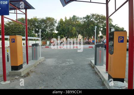 Portal and ticket box for vehicles entering the parking area. Stock Photo