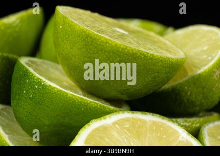 Sliced Open Limes in Close Focus Stock Photo