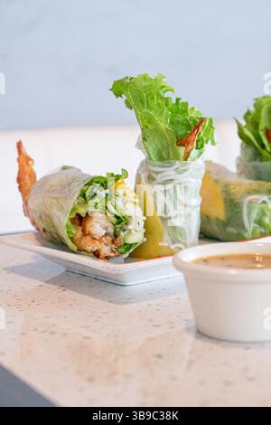 Bright Asian style spring rolls with tempura shrimp Stock Photo