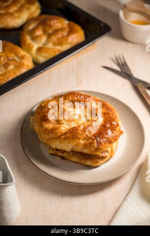 Homemade cottage cheese pies on a plate Stock Photo