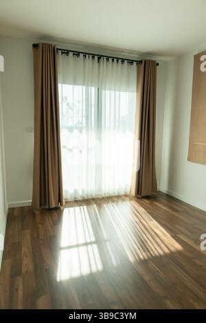 Curtain window interior decoration in living room on sunny day with sunlight Stock Photo