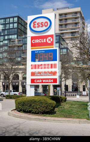 Canadian Gas Station Sign On Lakeshore Road Burlington Ontario Canada A Busy Road In The Downtown Of Burlington, April 23, 2025 Stock Photo Stock Photo