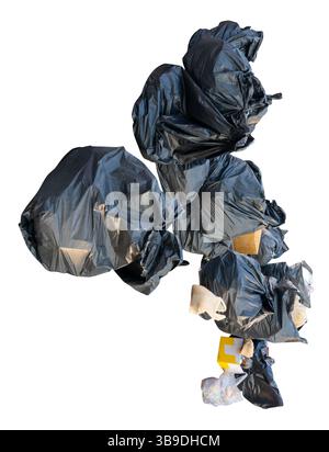 Large group of waste in black plastic bag at garbage dump is isolated on white background with clipping path. Stock Photo