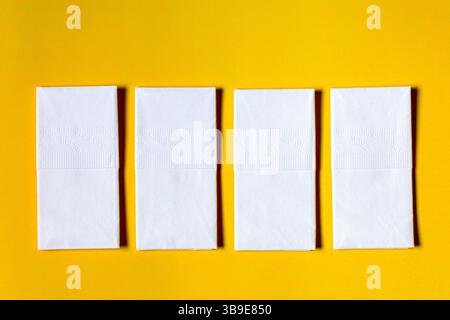A neatly arranged stack of white dry tissues on a plain background. The image highlights the soft texture, cleanliness, and hygienic nature of the pro Stock Photo