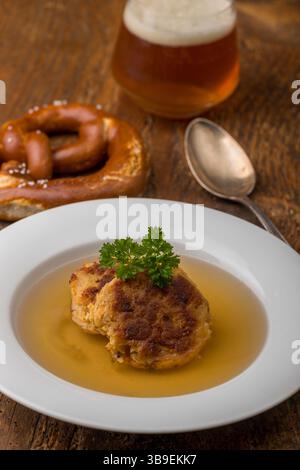 Austrian cheese dumpling in broth Stock Photo