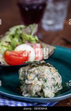 Rustic spinach dumpling with salad Stock Photo