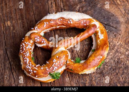Bavarian butter pretzel on wood Stock Photo